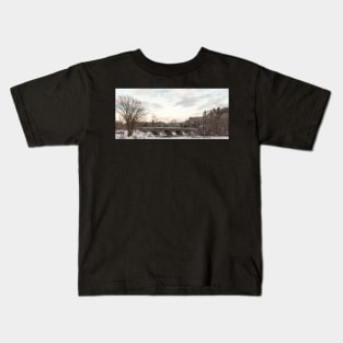 A snowy winter landscape Kids T-Shirt